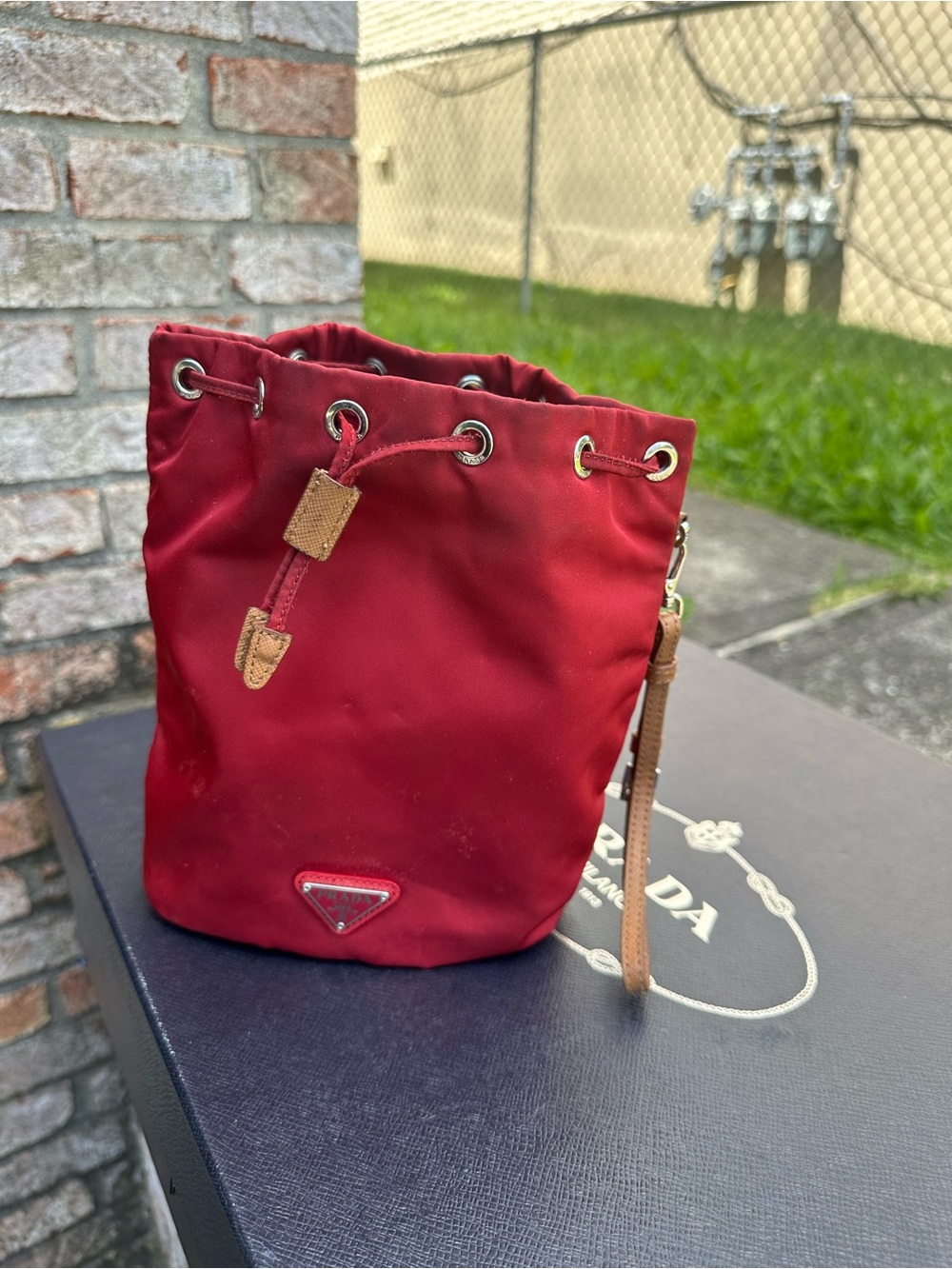 Prada Red Nylon Mini Drawstring Bucket Bag with Tan Leather Trim